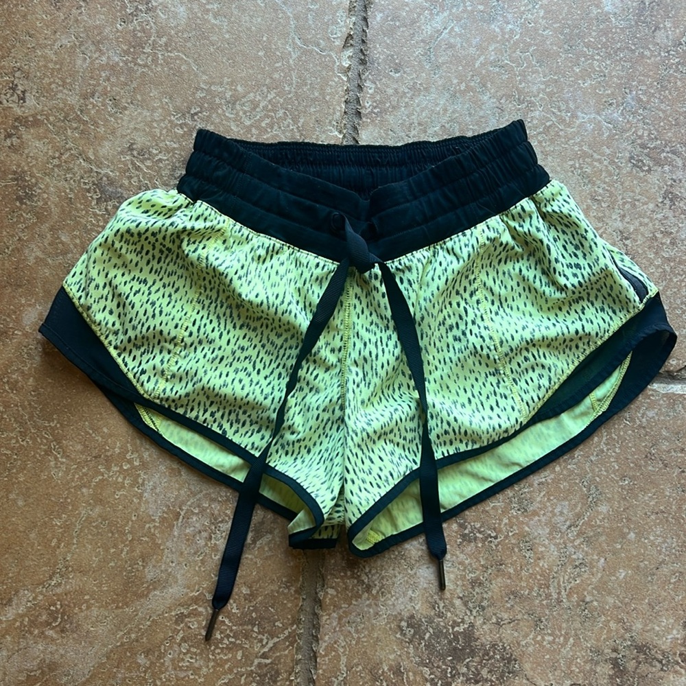 Lululemon running shorts Size 4, neon yellow with black spots, 2.5 inch inseam